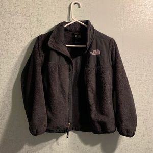 Girls black North Face fleece jacket.